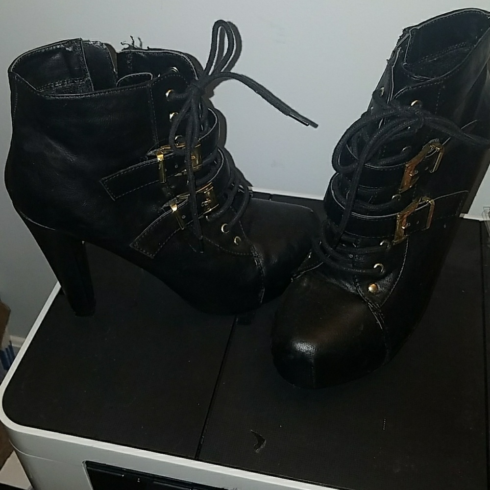 Black ankle boots gold buckles
