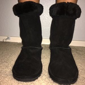 Black fuzzy boots.