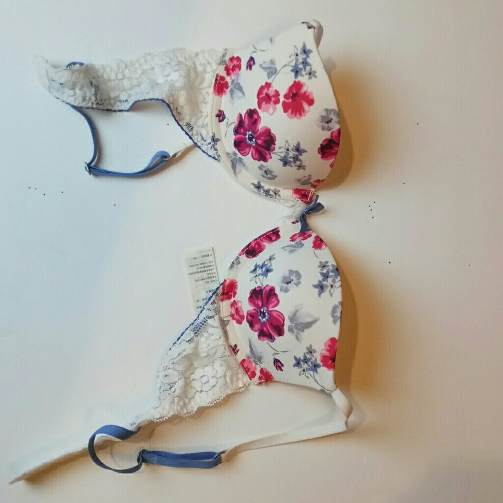 never used,  new,  flowery blue belt bra