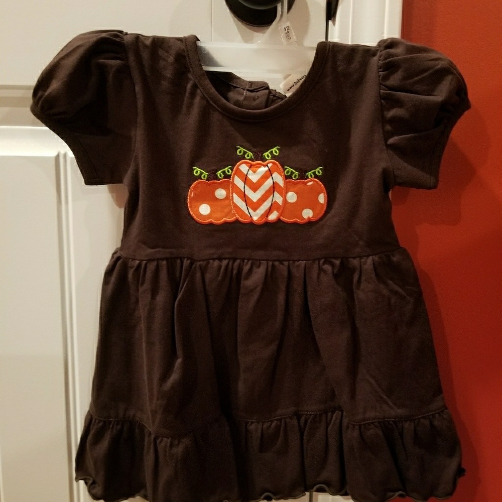 Brand new with tags 12month girl's pumpkin dress