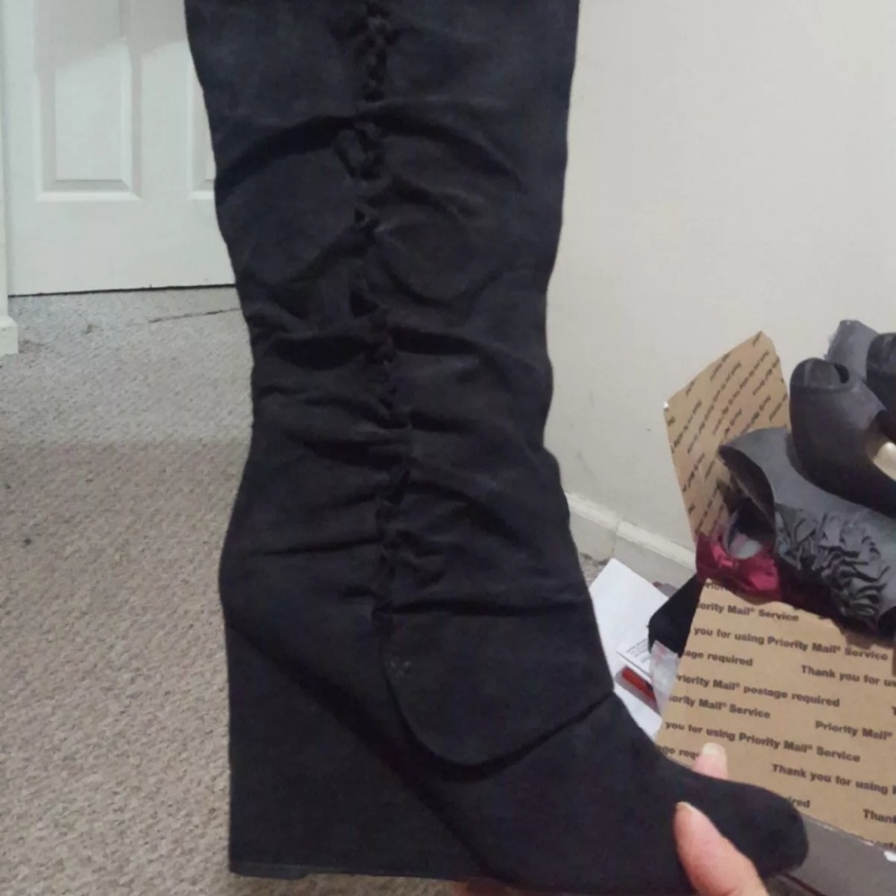 Black wedge boots