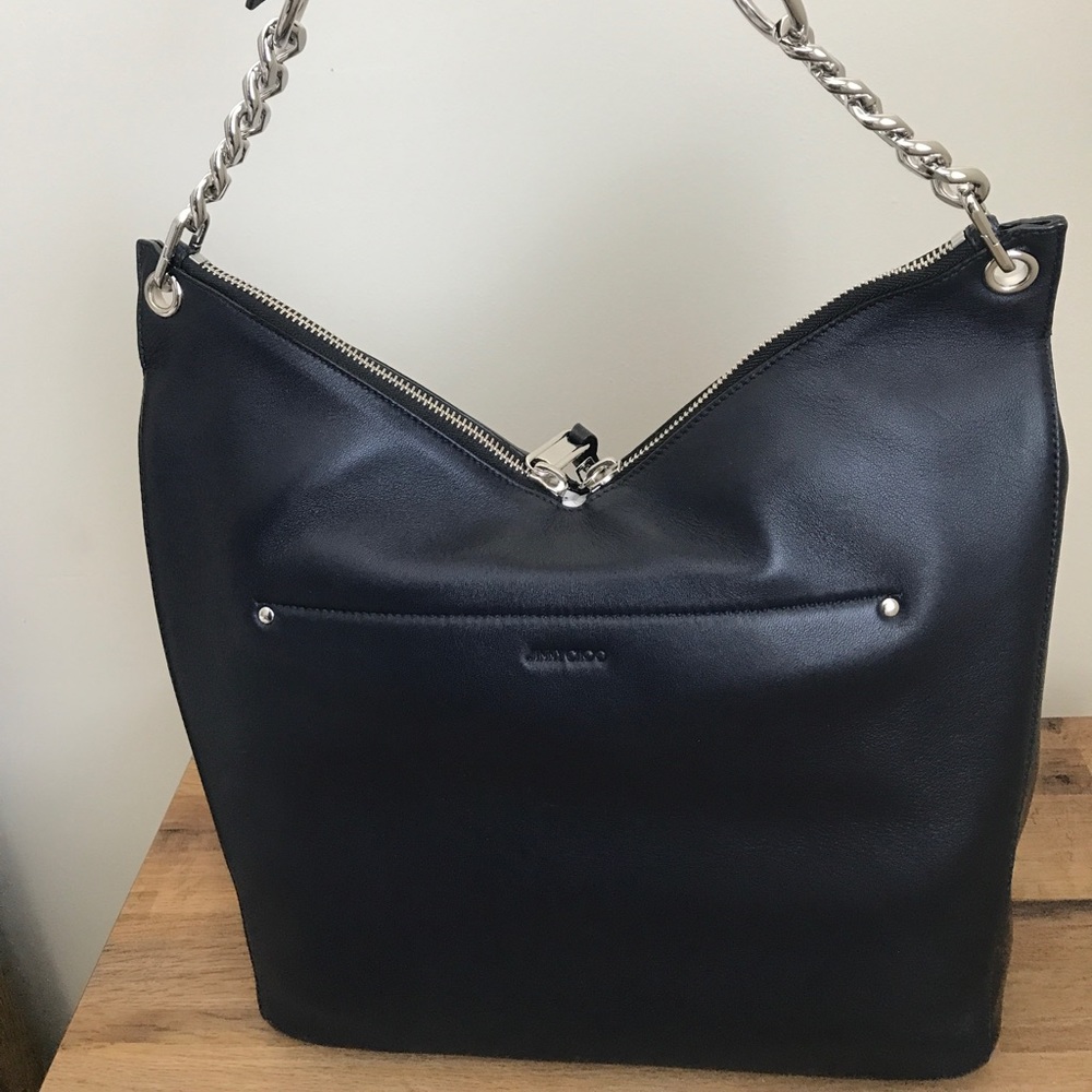 SOLD.       Jimmy Choo "Raven" Purse