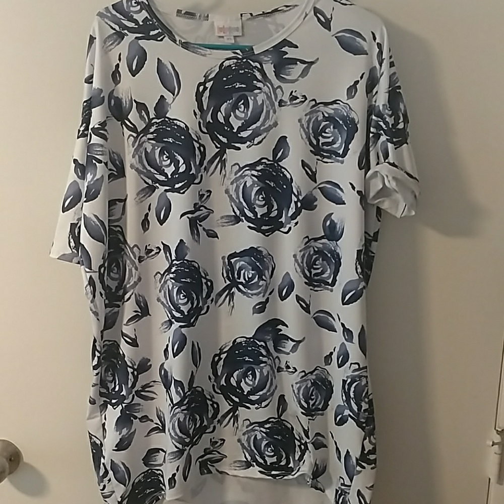 LuLaroe xs floral irma.  This was a major unicorn!