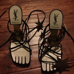 YSL White black leather wrap star 'Hero' YSL White black leather wrap star 'Hero'