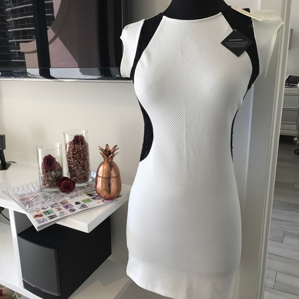 Nasty Gal White with black laced back!