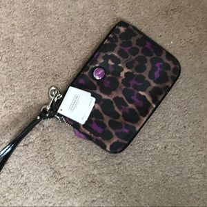 Authentic Coach cheetah purple wristlet