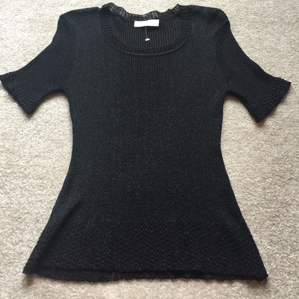 3/$25 Black shimmer top. Bundle and save .