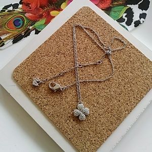 Swarovsky silver four leaf clover necklace..