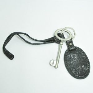 Fossil Purse Charm Metal and Leather Hang Tag Fossil Purse Charm Metal and Leather Hang Tag