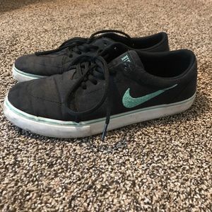 Black and blue Nike shoes