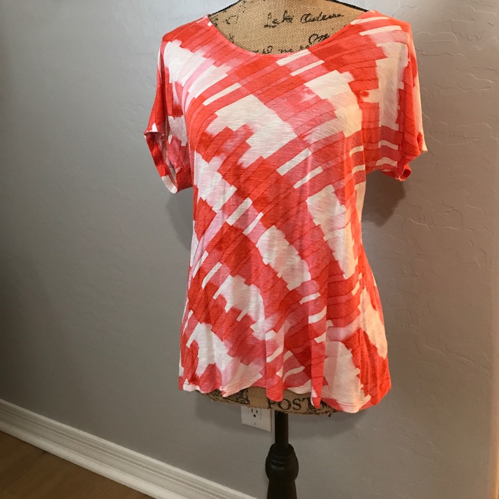 Orange patterned anthropology blouse