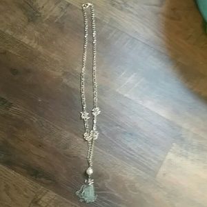 Gold tassel necklace with pink pearls