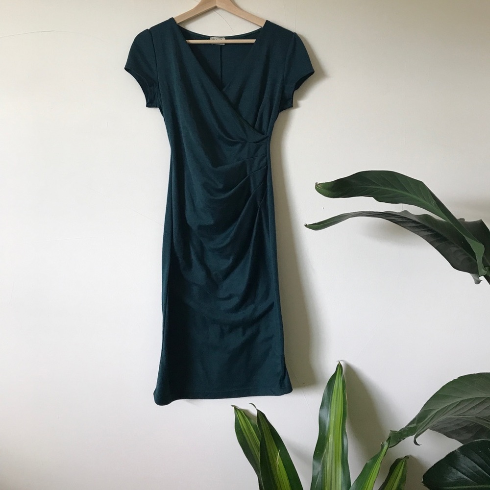Form fitting teal pencil dress