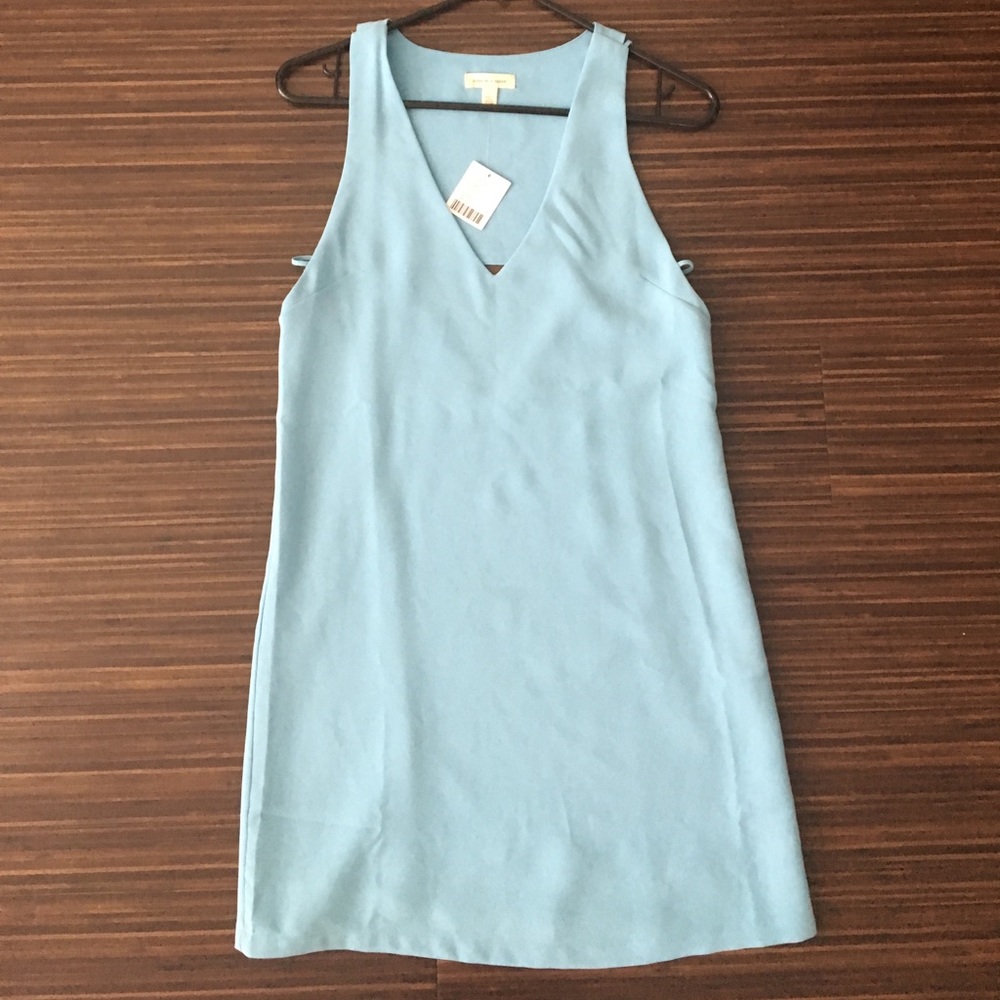 Open back cutout mini shift. Never worn, with tags