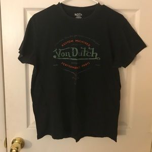 Black t shirt with orange and green writing