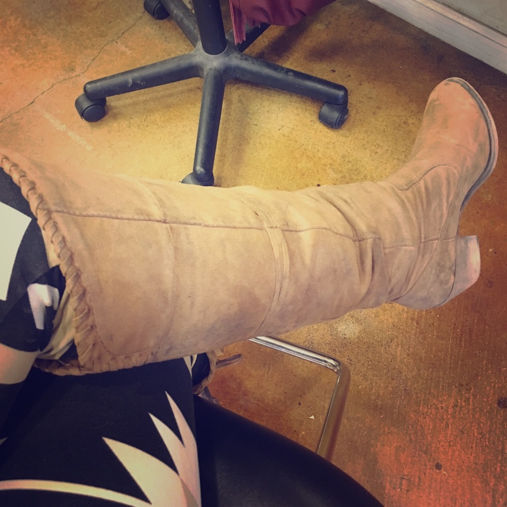 Knee high low heeled boots