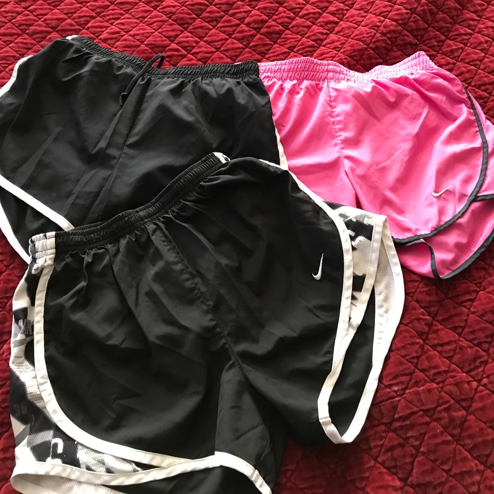 3 pairs of Nike running shorts