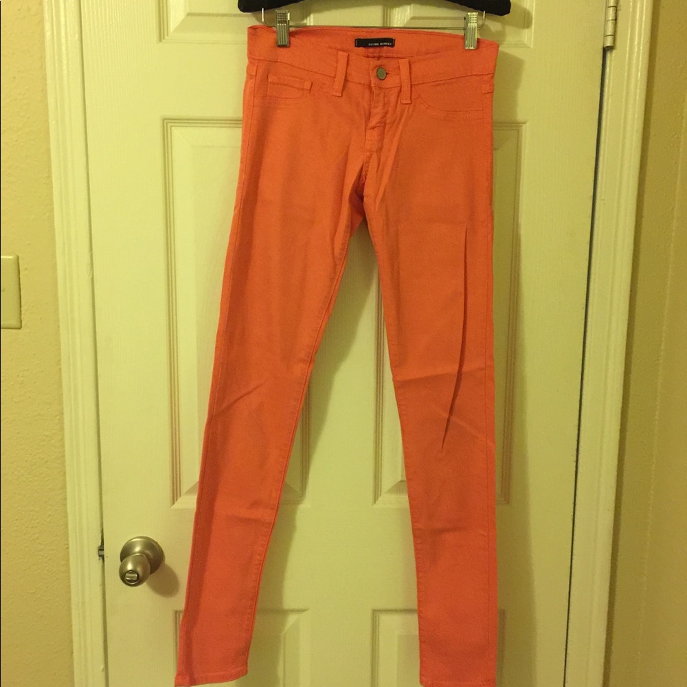 Salmon colored jeans