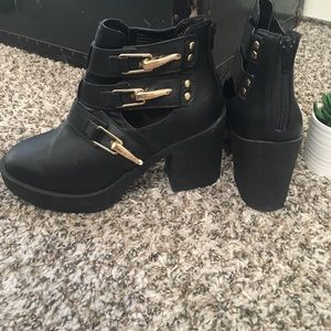 Black booties with buckles