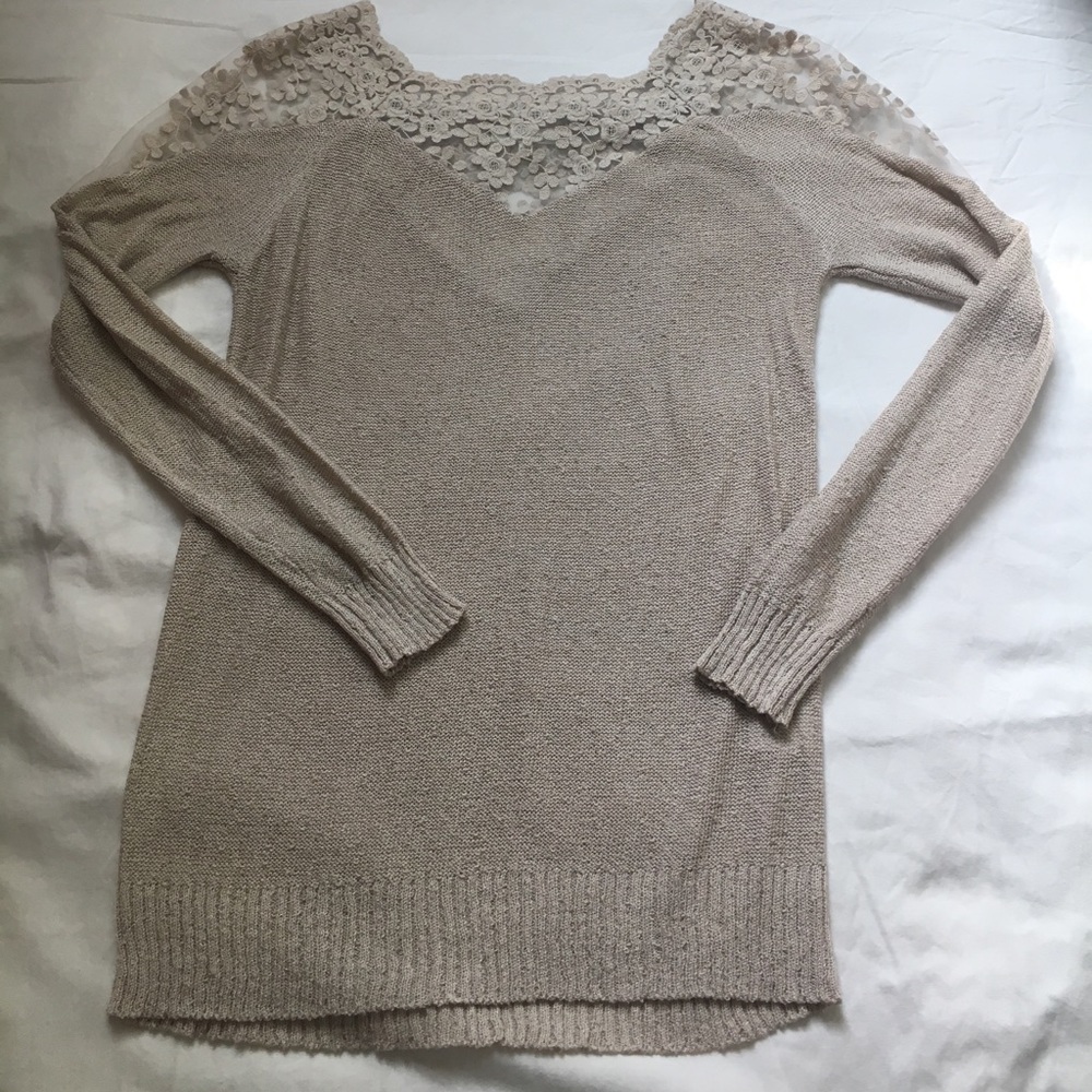 Gorgeous tan long sleeve with embroidered detail.