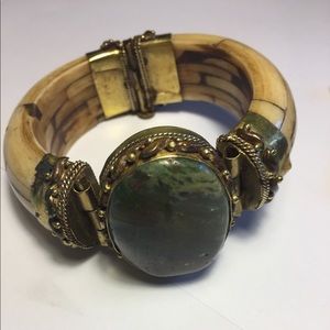Horn and brass cuff.