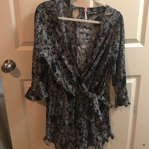 Free People romper. Deep v, and ties on the side