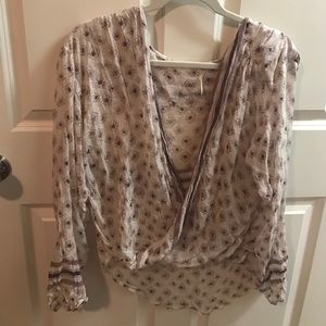 Blouse, longer in back, crosses across the front