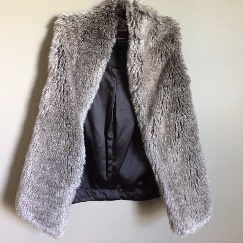 Faux fur vest with leather back