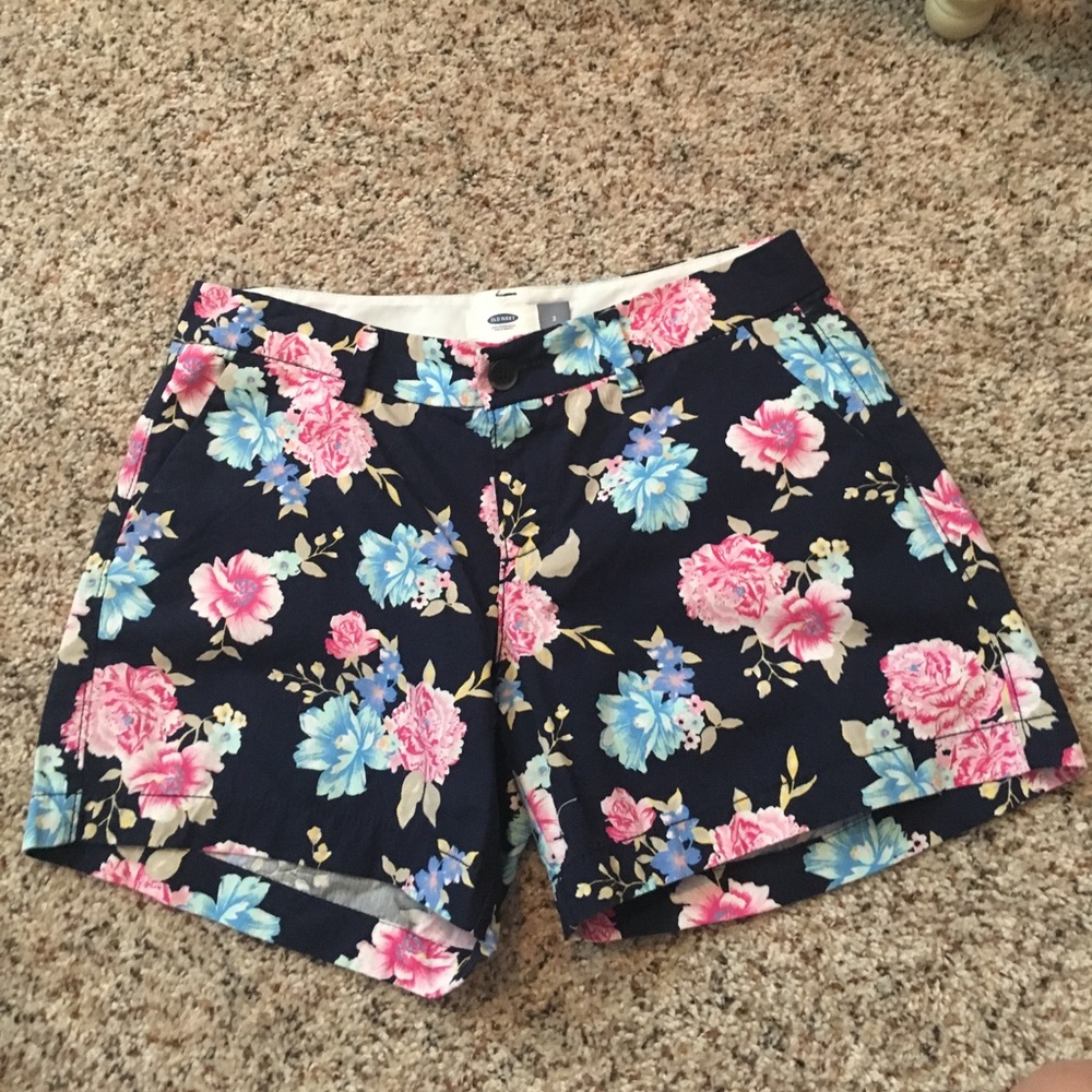 Navy blue shorts with all-over floral print