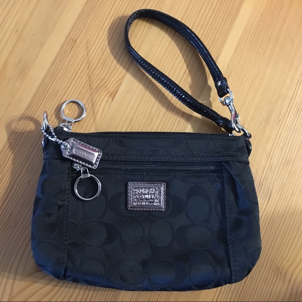 Coach black wristlet! Perfect condition. Used 2x's
