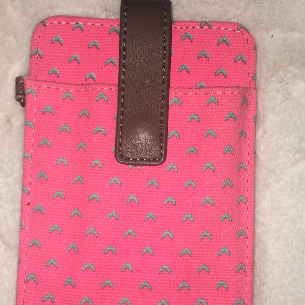 Bright pink and brown wallet with phone holder