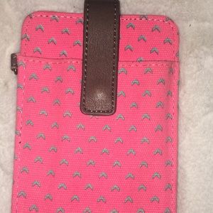 Bright pink and brown wallet with phone holder