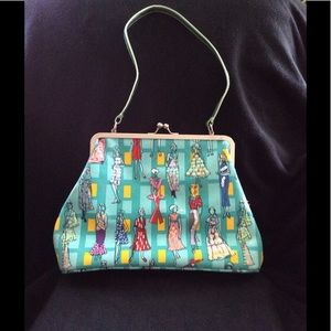 Fun handbag w/ prints of vintage dressed women