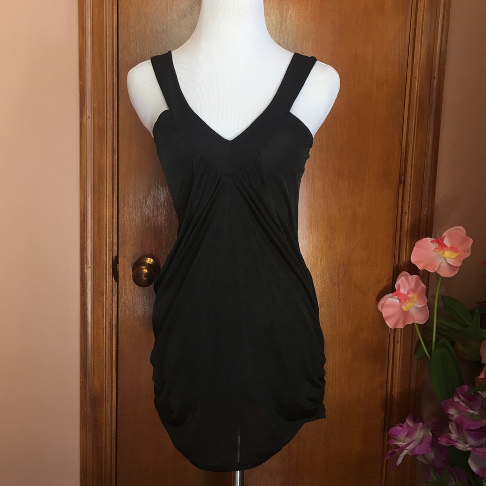 Sydney Joy: Curve hugging silk black tunic top