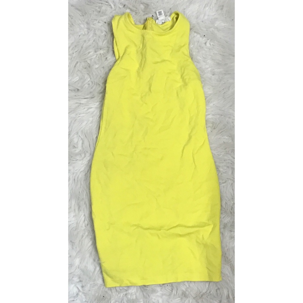 Yellow body con mini dress.