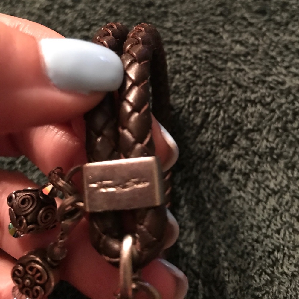 Brown leather bracelet with 2 silver dangle charms
