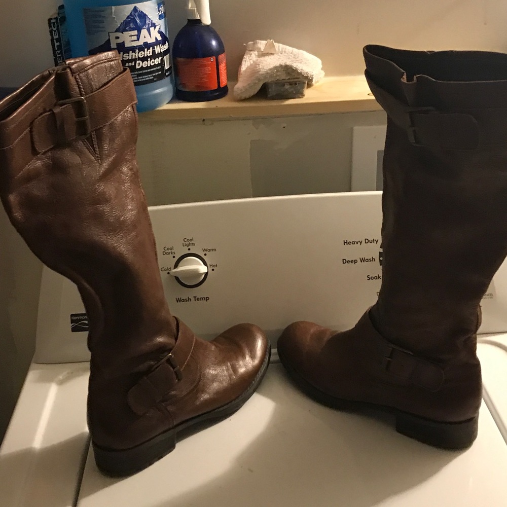 Tall brown leather boots