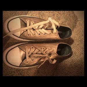 Gold Converse sneakers