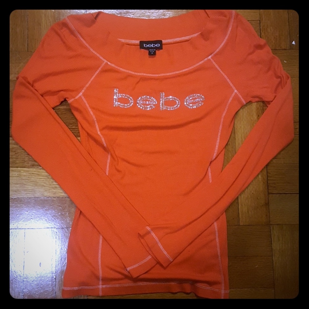 Orange long sleeved top