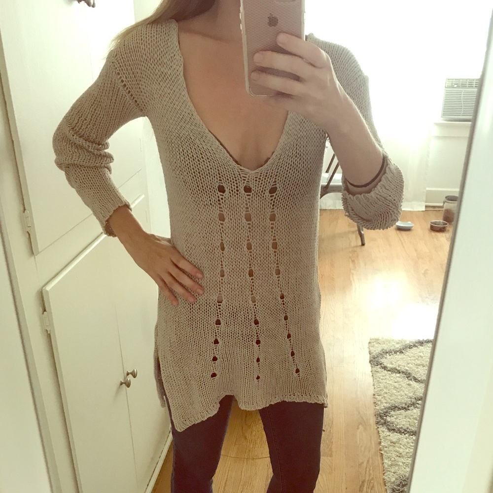 Label and Thread open knit sweater in beige.