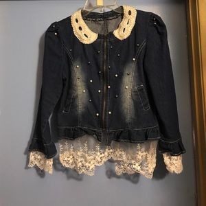 Dainty jean jacket with lace and a pearl collar.