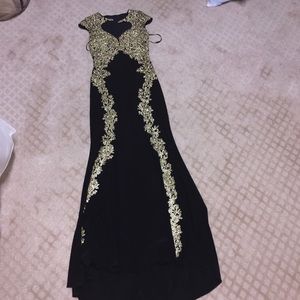 Black and gold long dress with train