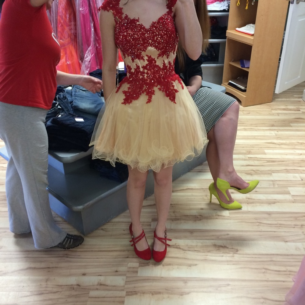 Red and champagne colored party dress