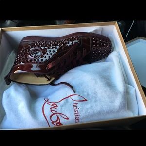 Louboutin. Red Bottoms.