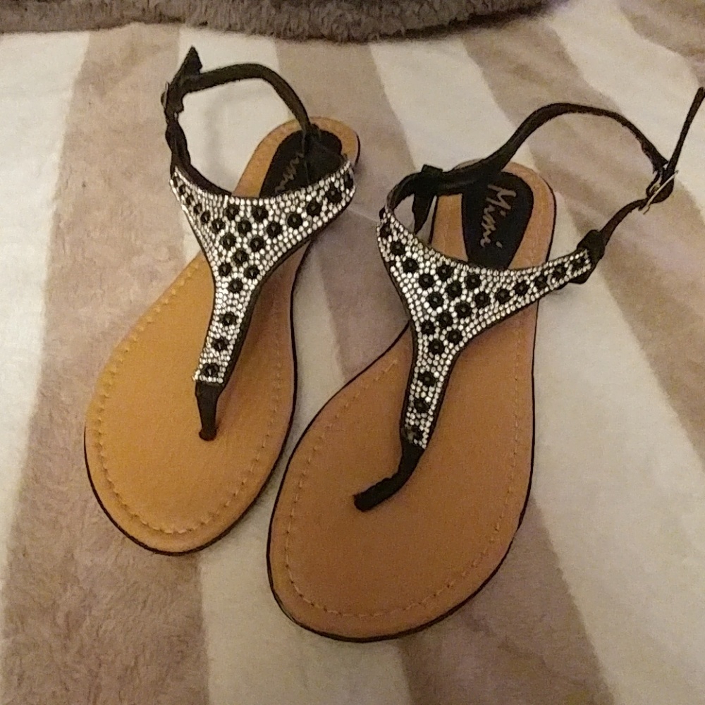 Silver and black rhinestone sandals.