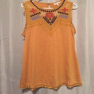 Yellow shirt with circle trim