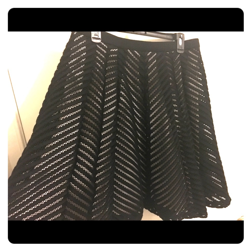 Black and white eyelet skirt with nude slip