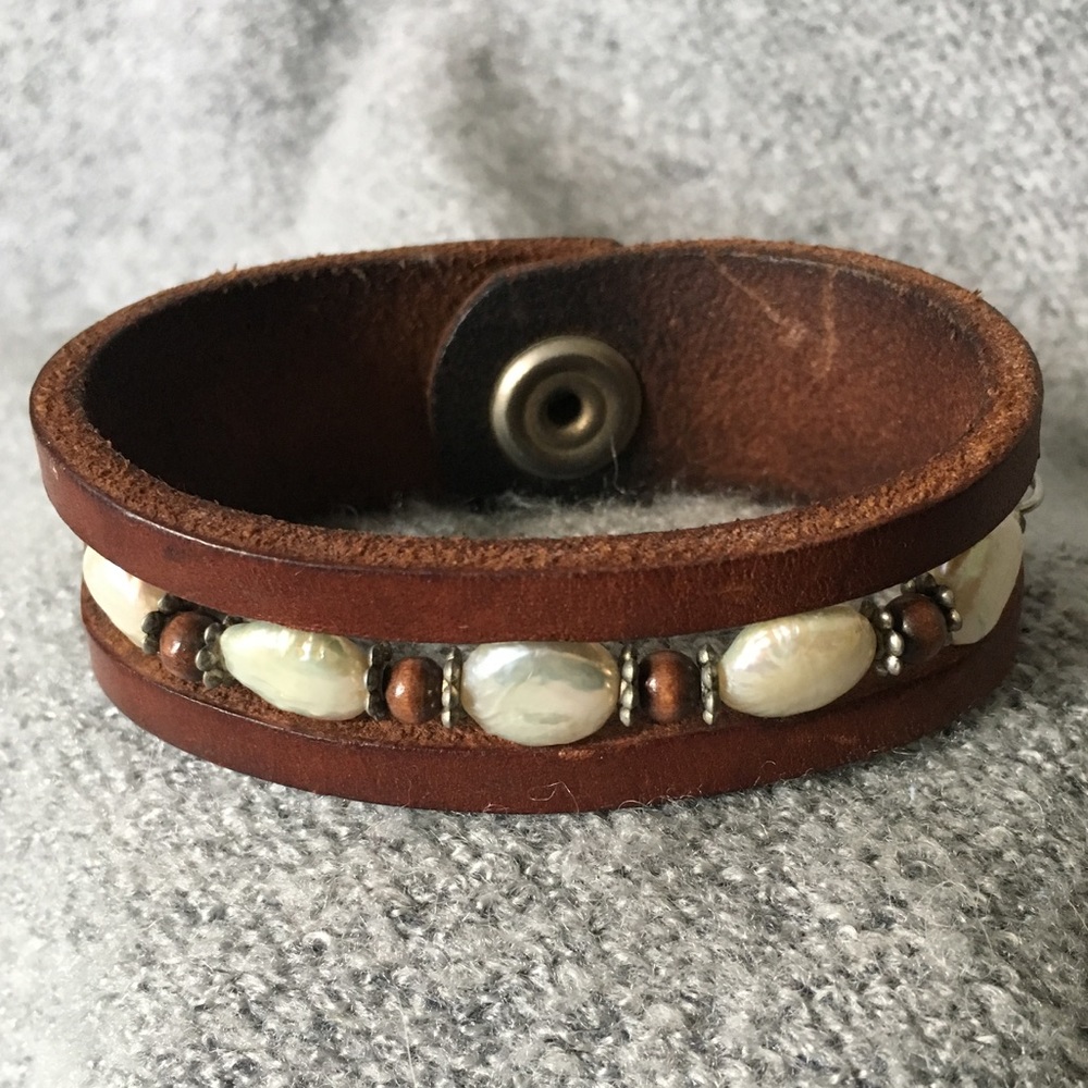 Leather cuff with beaded cutout