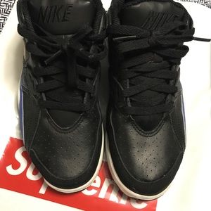 Worn black and royal blue Bo Jacksons in sz 7Y