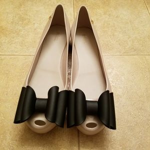 Melissa tan ballerina flat with peep-toe and bow